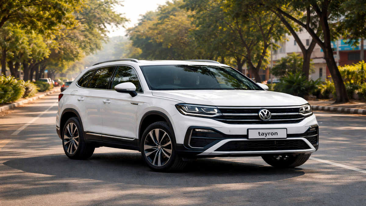 Volkswagen Tayron front 3 quarter view in pure white on Indian road