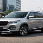 MG Hector Plus SUV parked on Indian city road in daylight