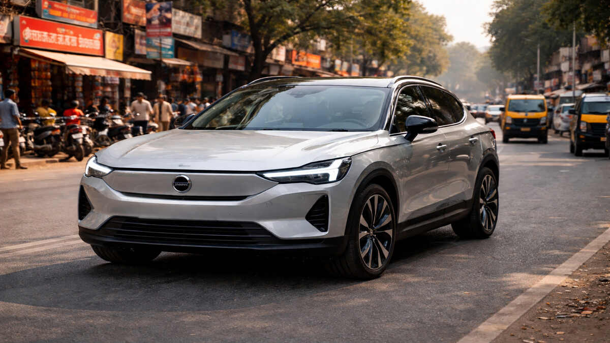 Volvo EX60 silver electric SUV front view on an Indian road, realistic 16:9 photo without number plate.